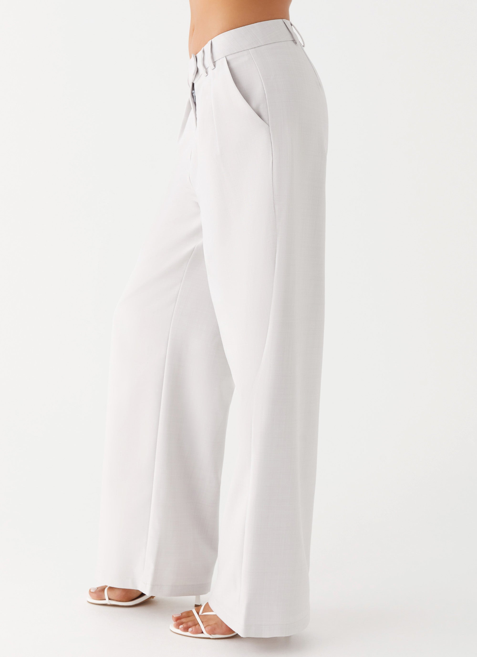 Womens Asha Low Rise Pants in the colour Ivory in front of a light grey background