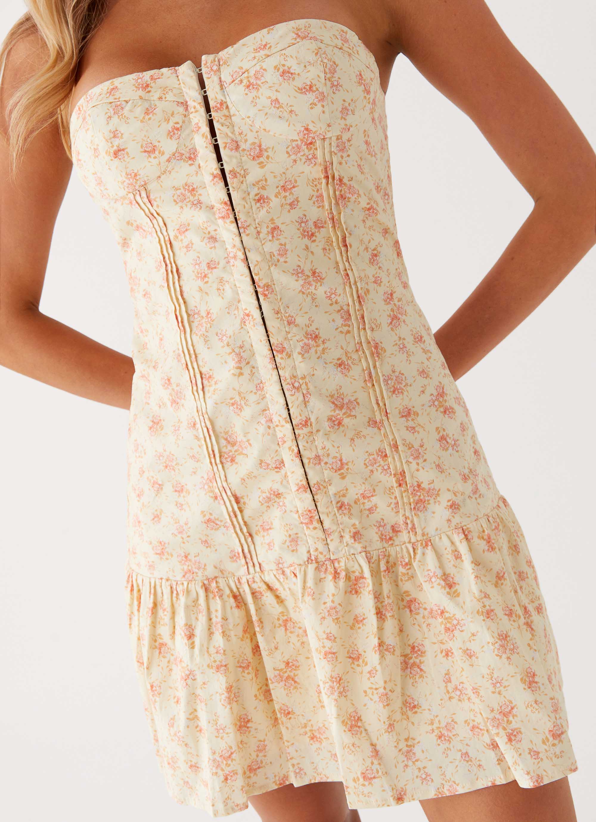 Womens Bloomsbury Bustier Mini Dress in the colour Yellow Ditsy Floral in front of a light grey background