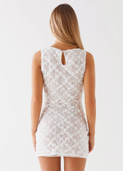 Womens Candace Mini Dress in the colour White in front of a light grey background