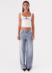 Womens Cadence Top in the colour White in front of a light grey background
