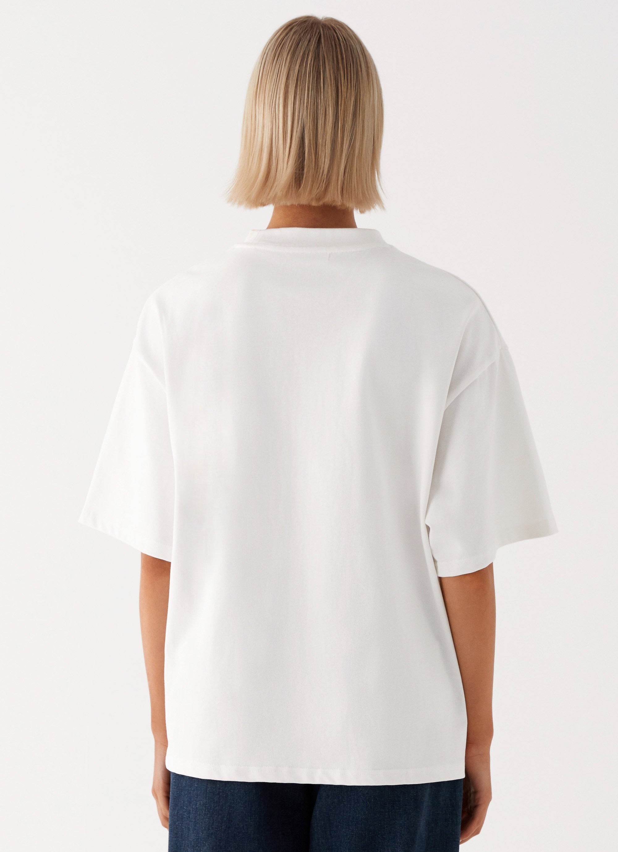 Womens Carefree Monogram Tin the colourShirt in the colour White in front of a light grey background