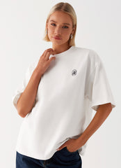 Womens Carefree Monogram Tin the colourShirt in the colour White in front of a light grey background