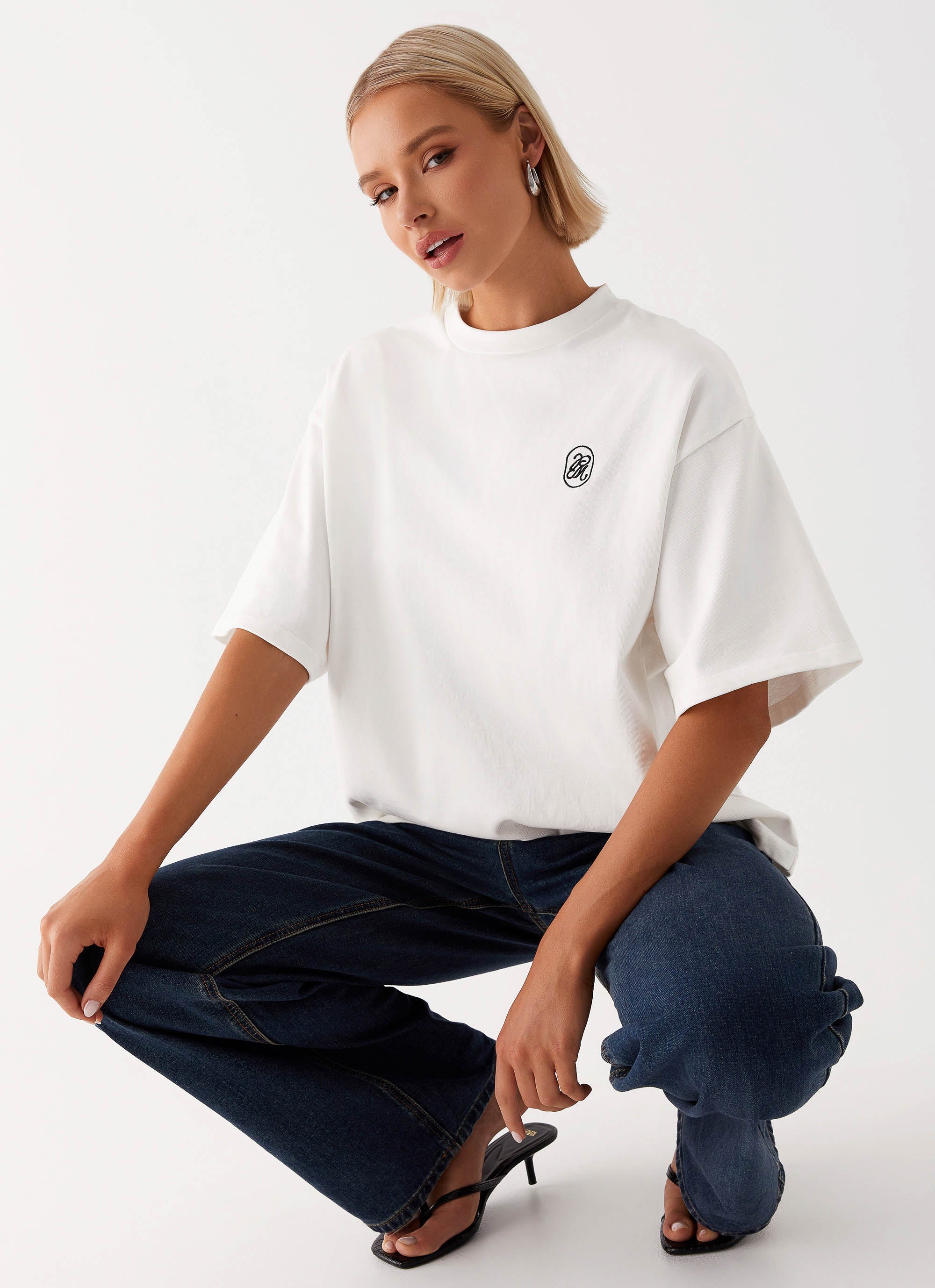 Womens Carefree Monogram Tin the colourShirt in the colour White in front of a light grey background