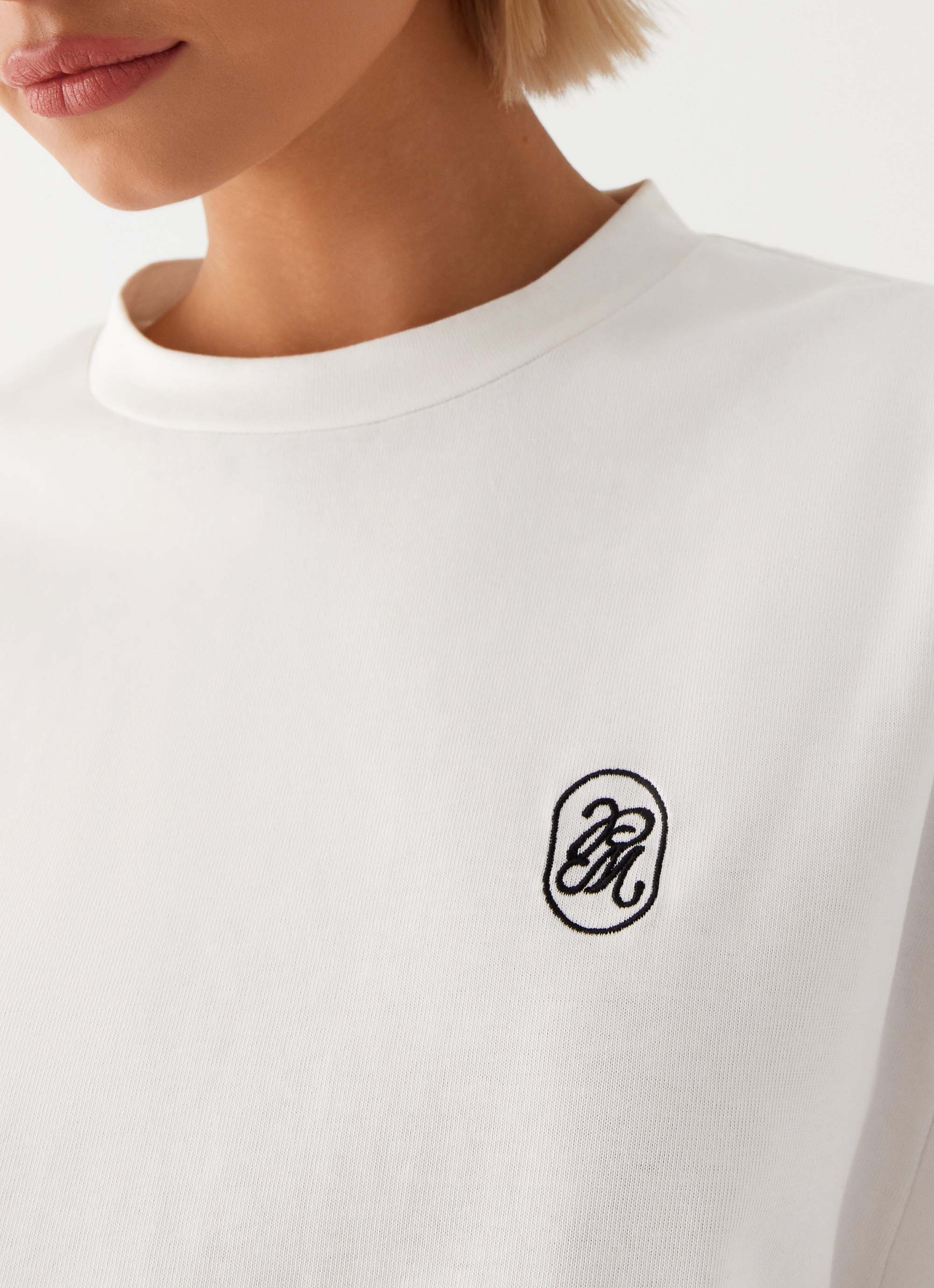Womens Carefree Monogram Tin the colourShirt in the colour White in front of a light grey background