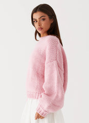 Womens Costella Knit Sweater in the colour Pink in front of a light grey background