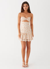 Womens Elowen Daisy Mini Dress in the colour White Ditsy Floral in front of a light grey background