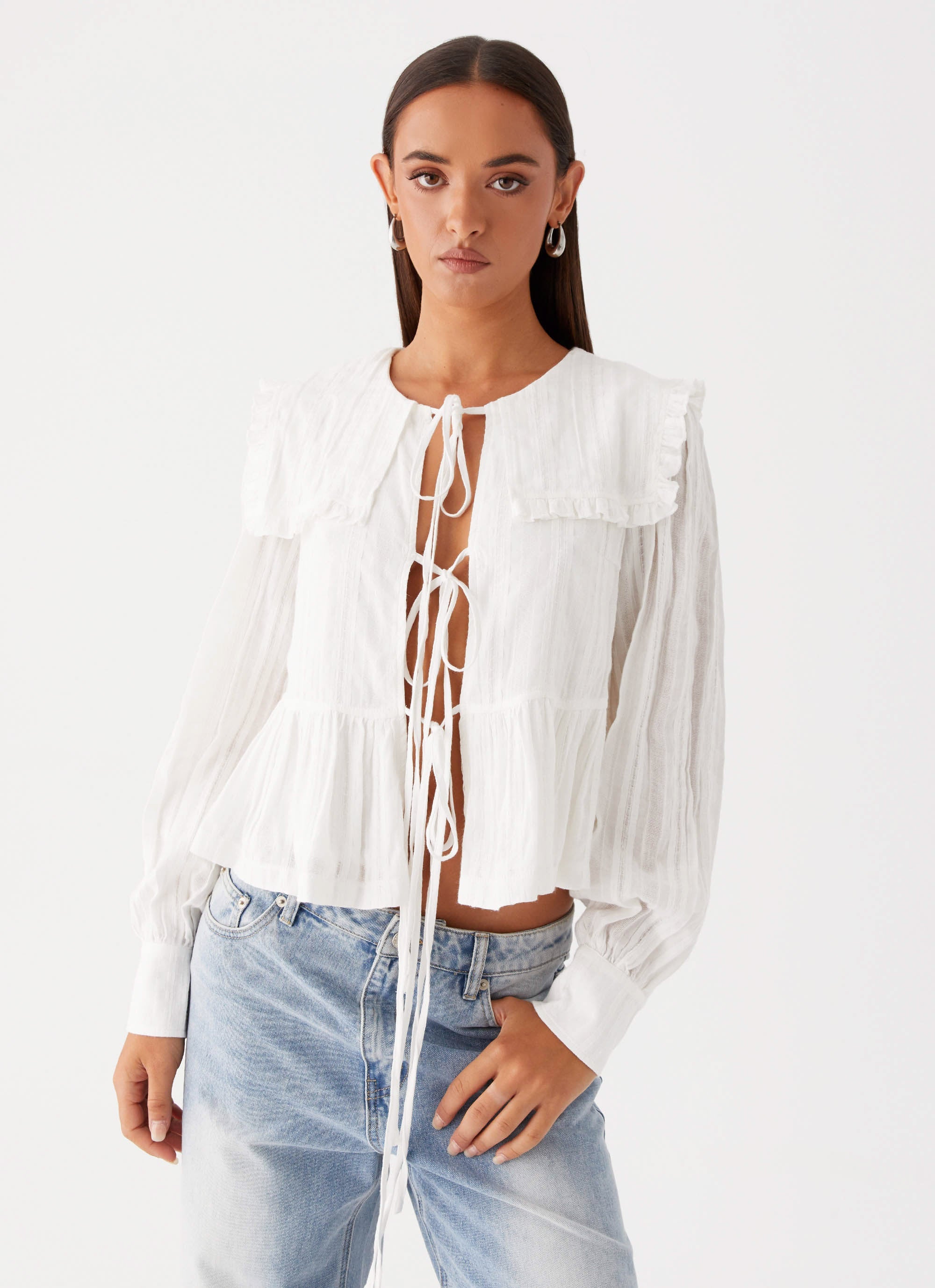 Womens Emerson Tie Front Long Sleeve Top in the colour White in front of a light grey background