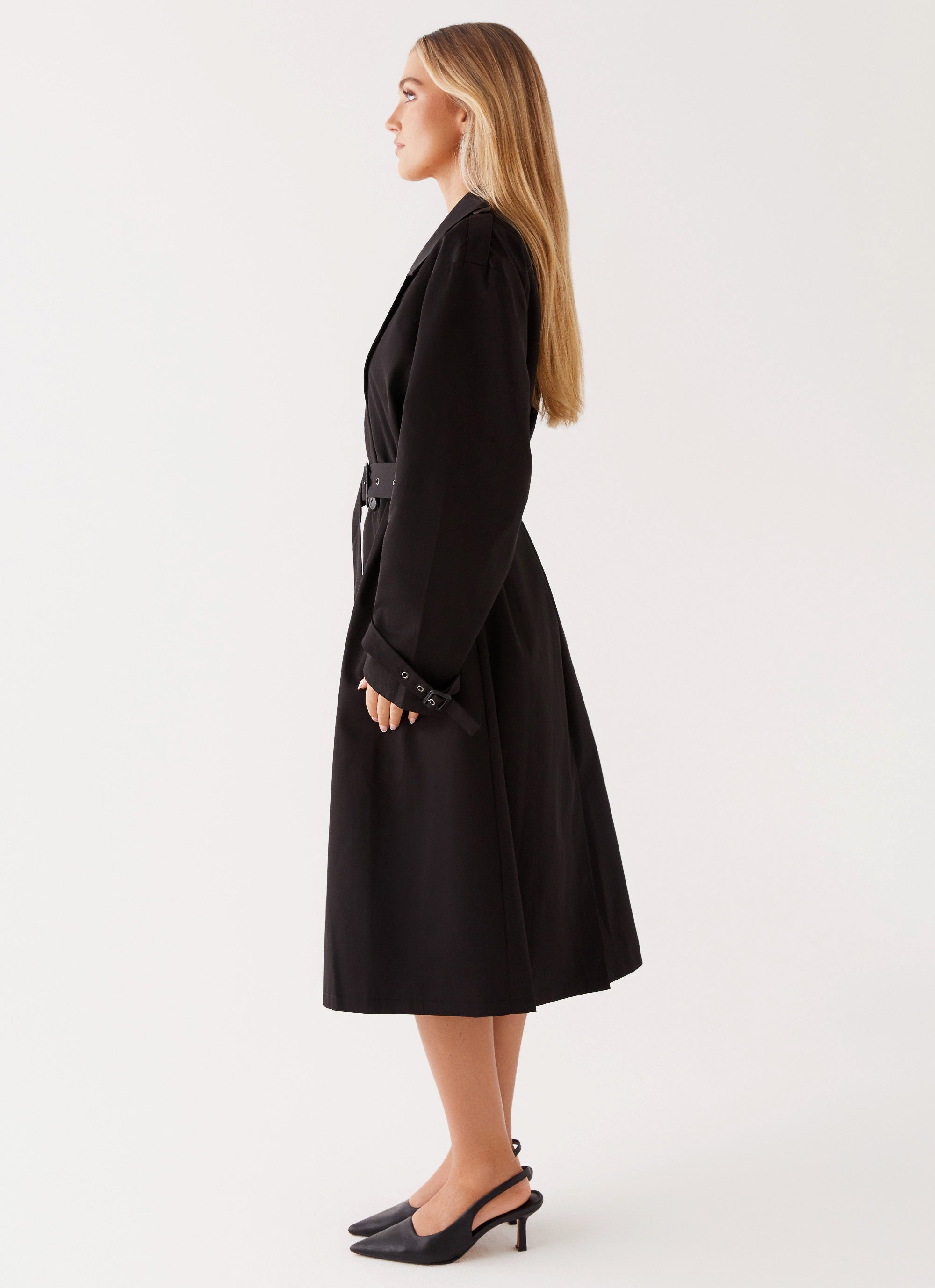 Womens Frenchy Oversized Trench Coat in the colour Black in front of a light grey background