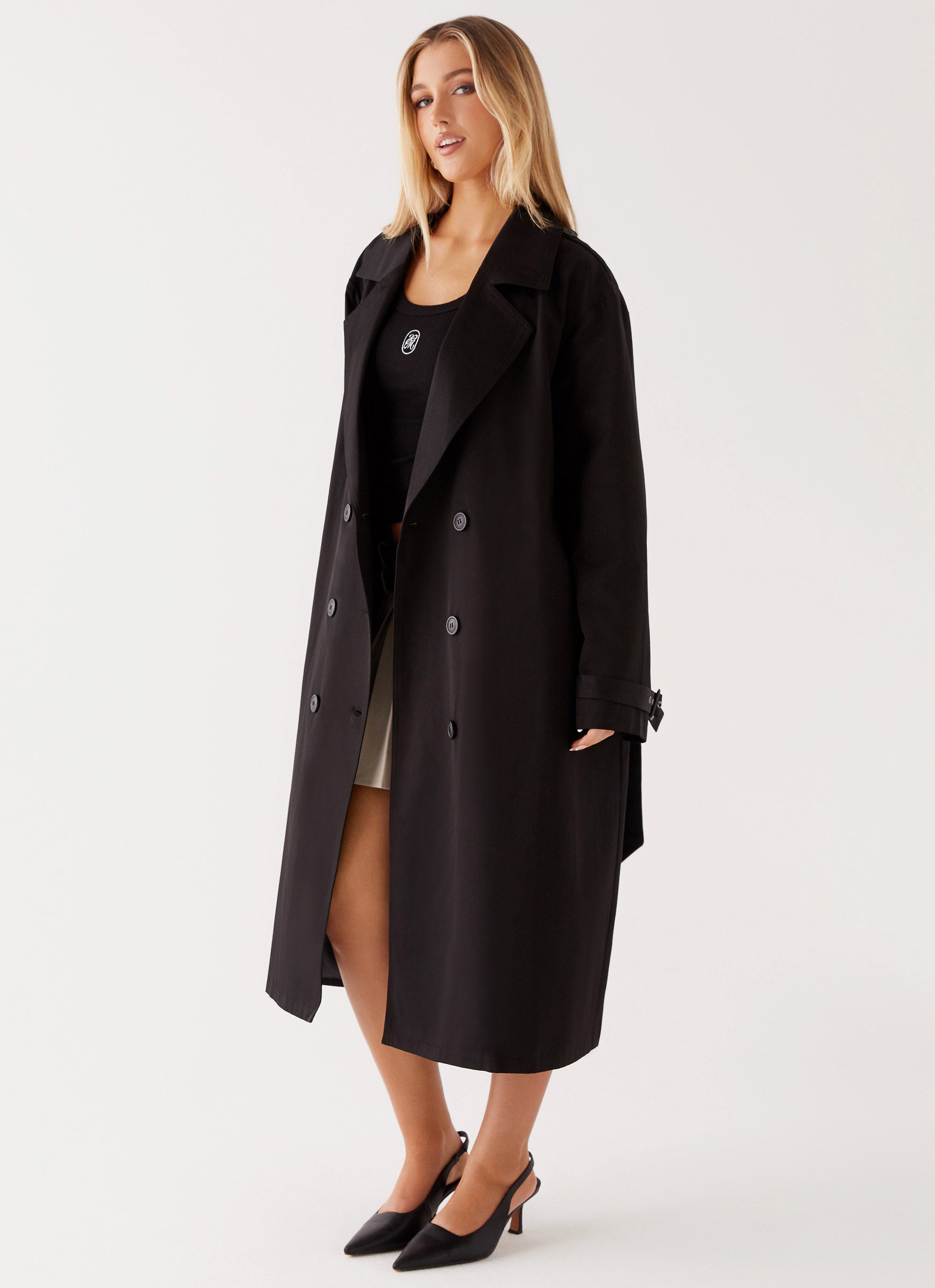 Womens Frenchy Oversized Trench Coat in the colour Black in front of a light grey background