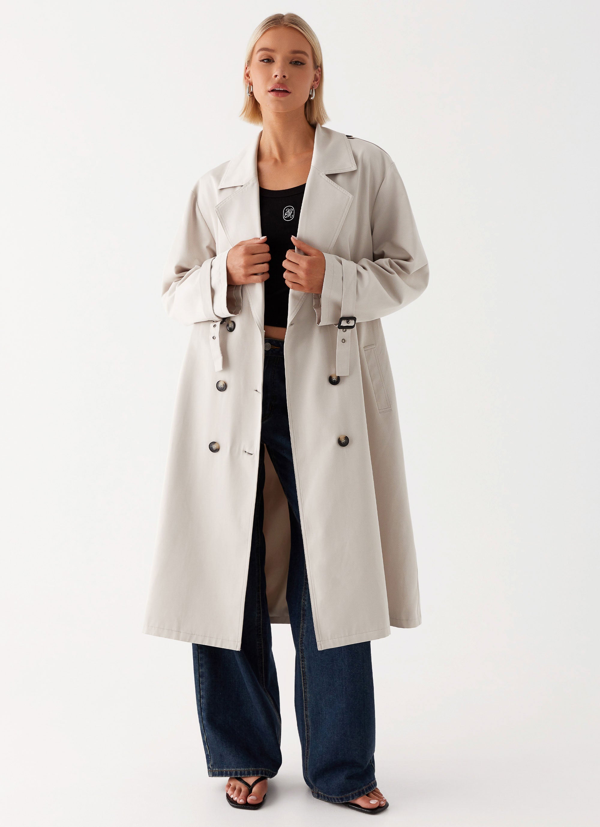 Womens Frenchy Oversized Trench Coat in the colour Stone in front of a light grey background