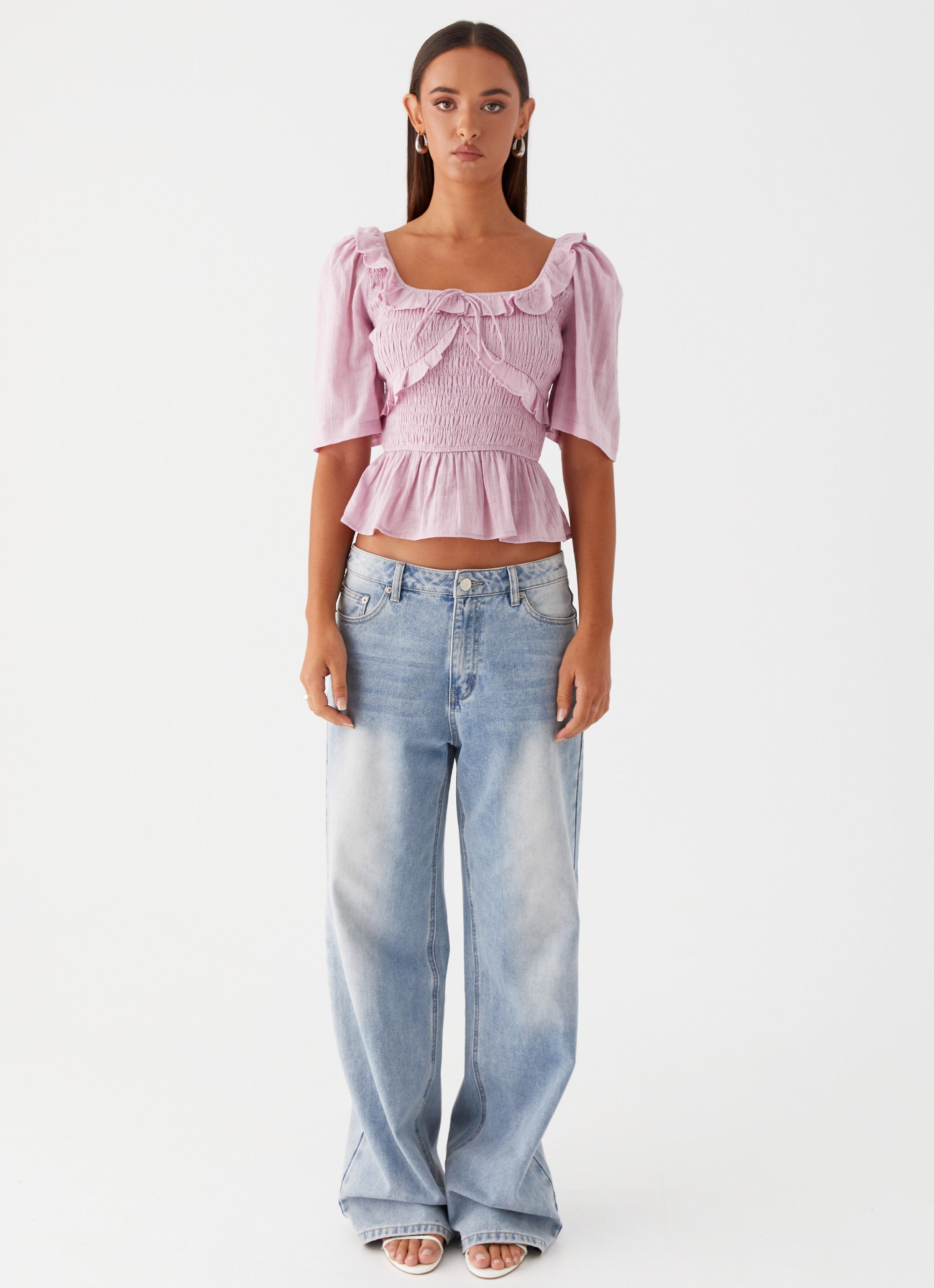 Womens Hidden Gem Shirring Top in the colour Purple in front of a light grey background