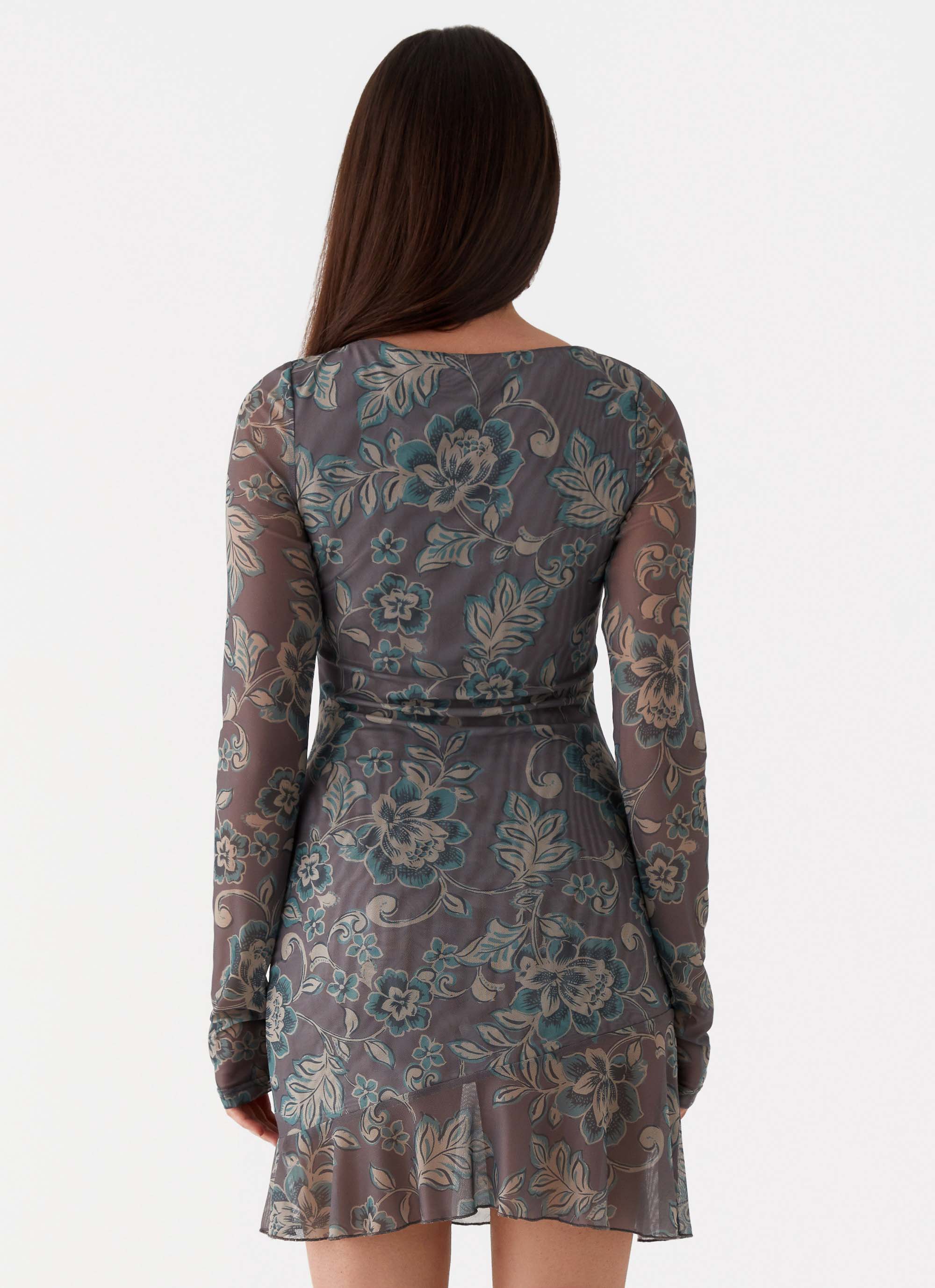 Womens Ines Long Sleeve Mini Dress in the colour Brown Floral in front of a light grey background