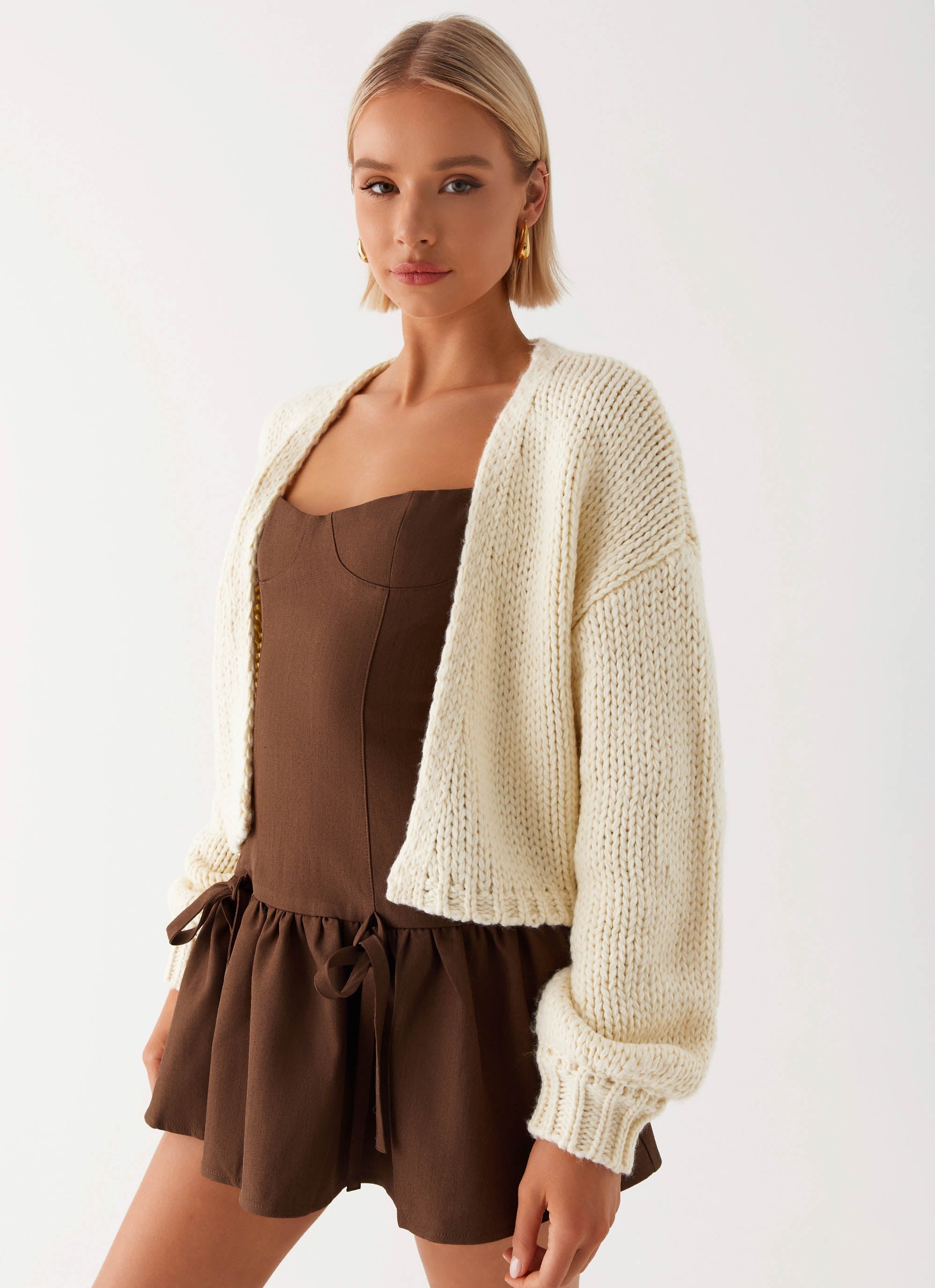 Womens Jasleen Knit Cardigan in the colour Ivory in front of a light grey background