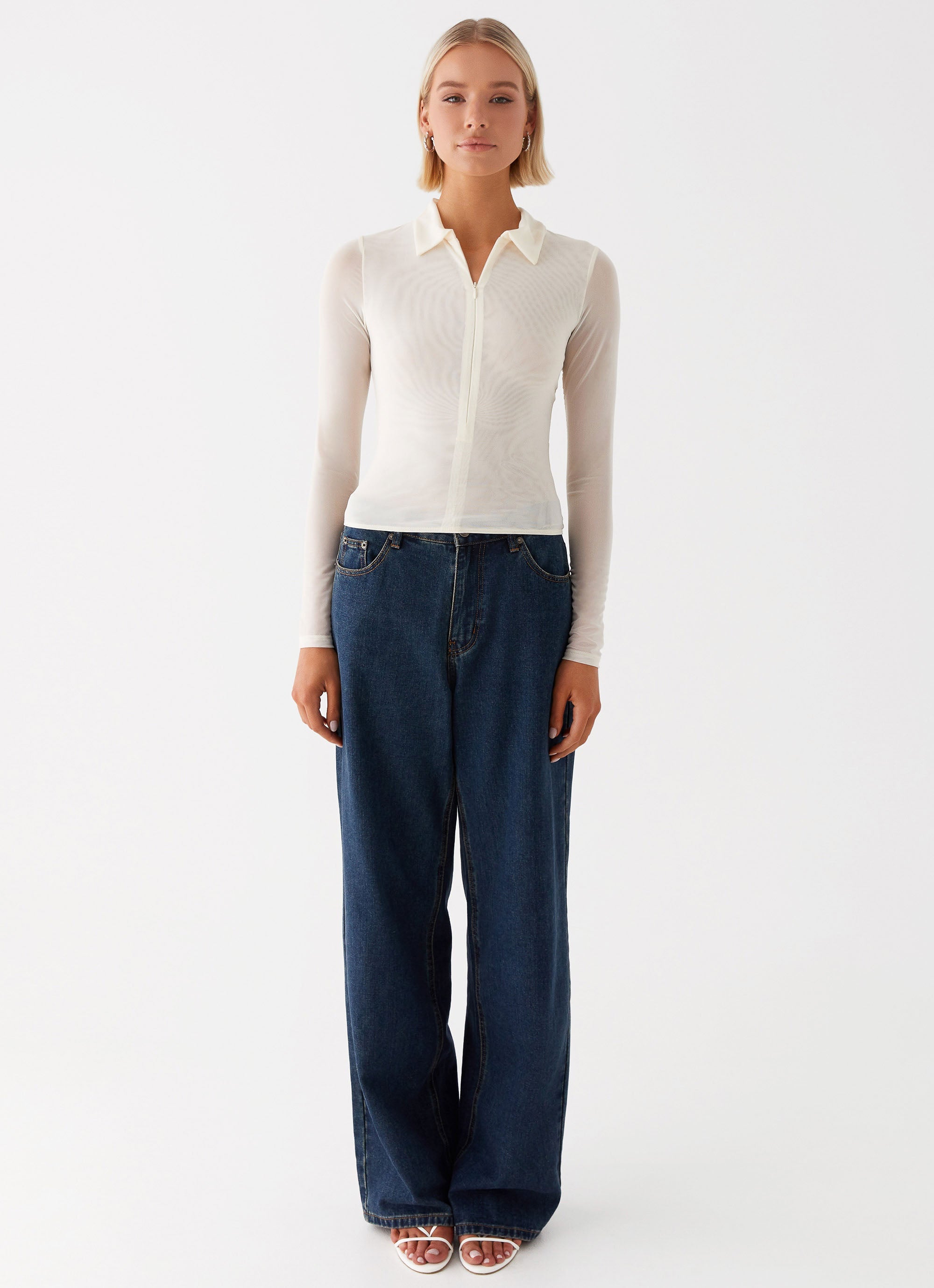 Womens Lorna Zip Up Shirt in the colour Ivory in front of a light grey background