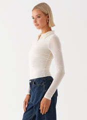 Womens Lorna Zip Up Shirt in the colour Ivory in front of a light grey background