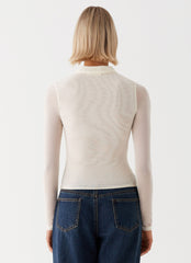 Womens Lorna Zip Up Shirt in the colour Ivory in front of a light grey background