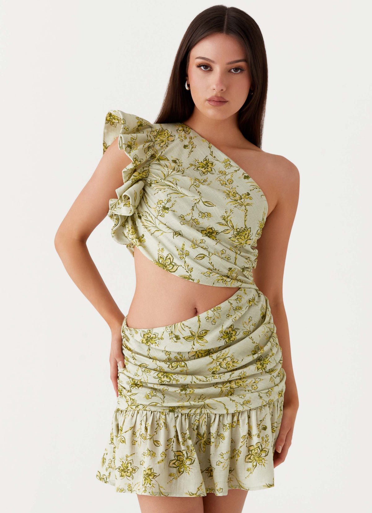 Womens Maisie Linen Mini Dress in the colour Sage Floral in front of a light grey background