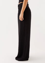 Womens Midnight City Suit Pants in the colour Black in front of a light grey background
