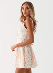 Womens Nash Bust Mini Dress in the colour White Ditsy Floral in front of a light grey background