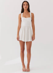 Womens Penelope Linen Mini Dress in the colour Ivory in front of a light grey background