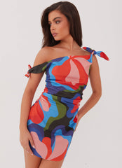 Womens Amazonia Linen Mini Dress in the colour Floral Fantasy in front of a light grey background