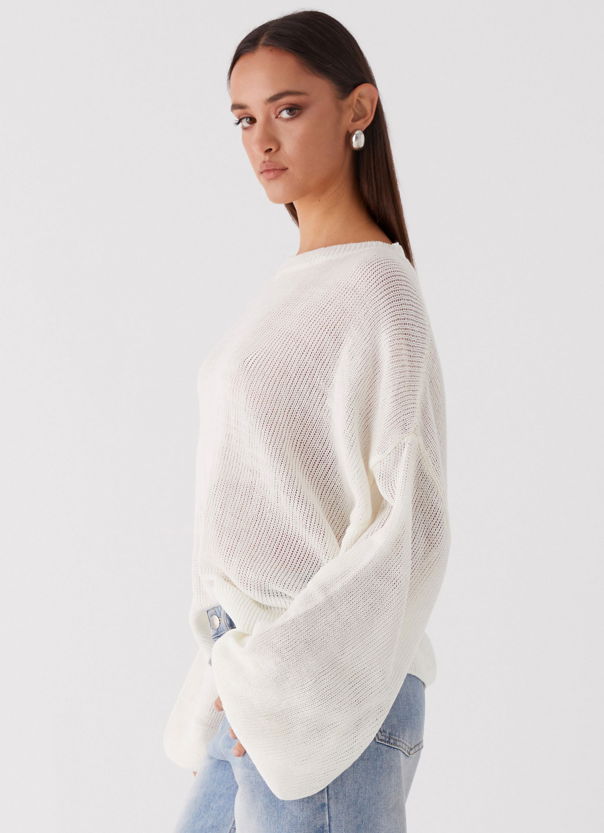 Womens Tyla Oversized Knit Sweater in the colour White in front of a light grey background