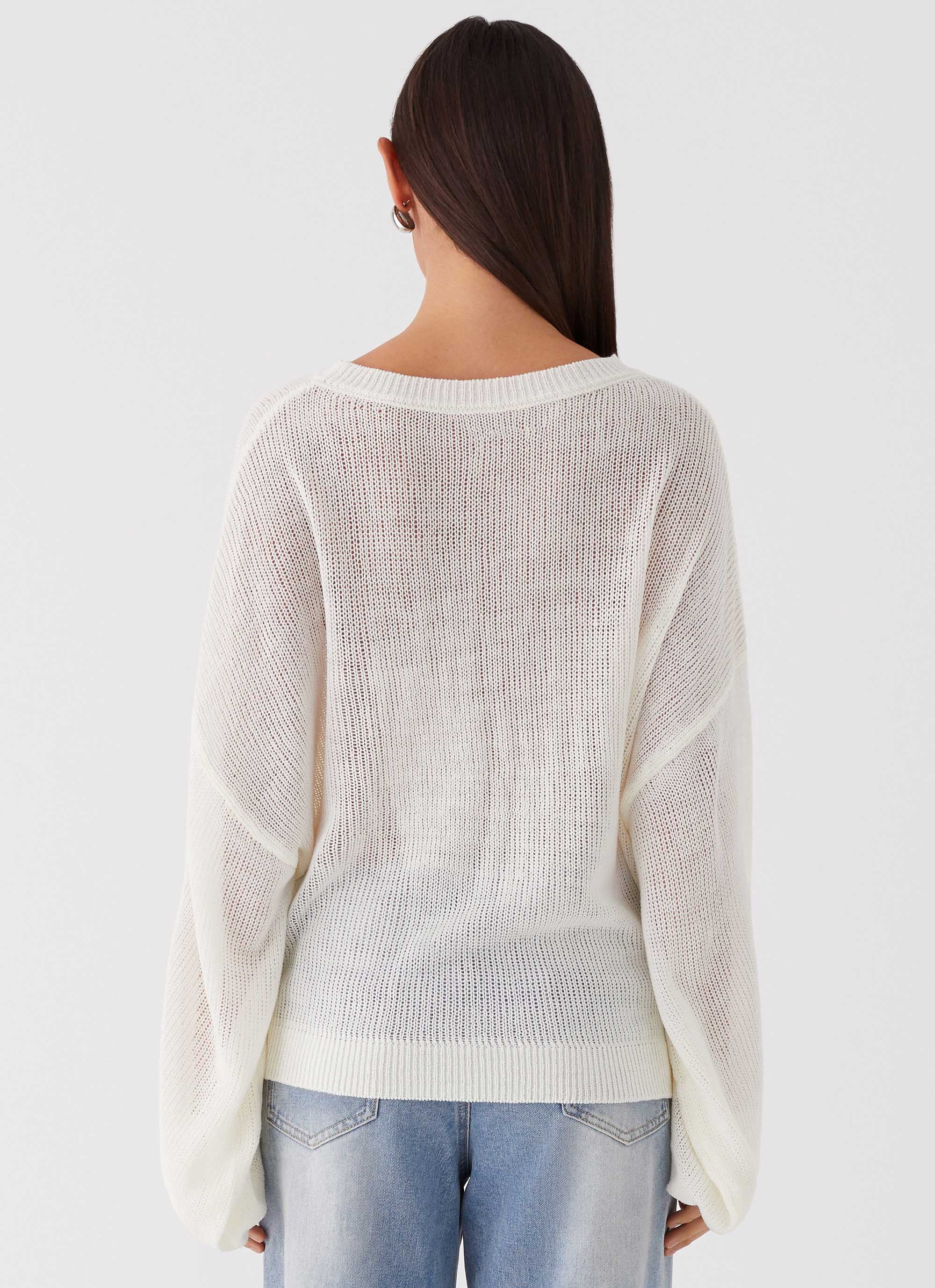 Womens Tyla Oversized Knit Sweater in the colour White in front of a light grey background