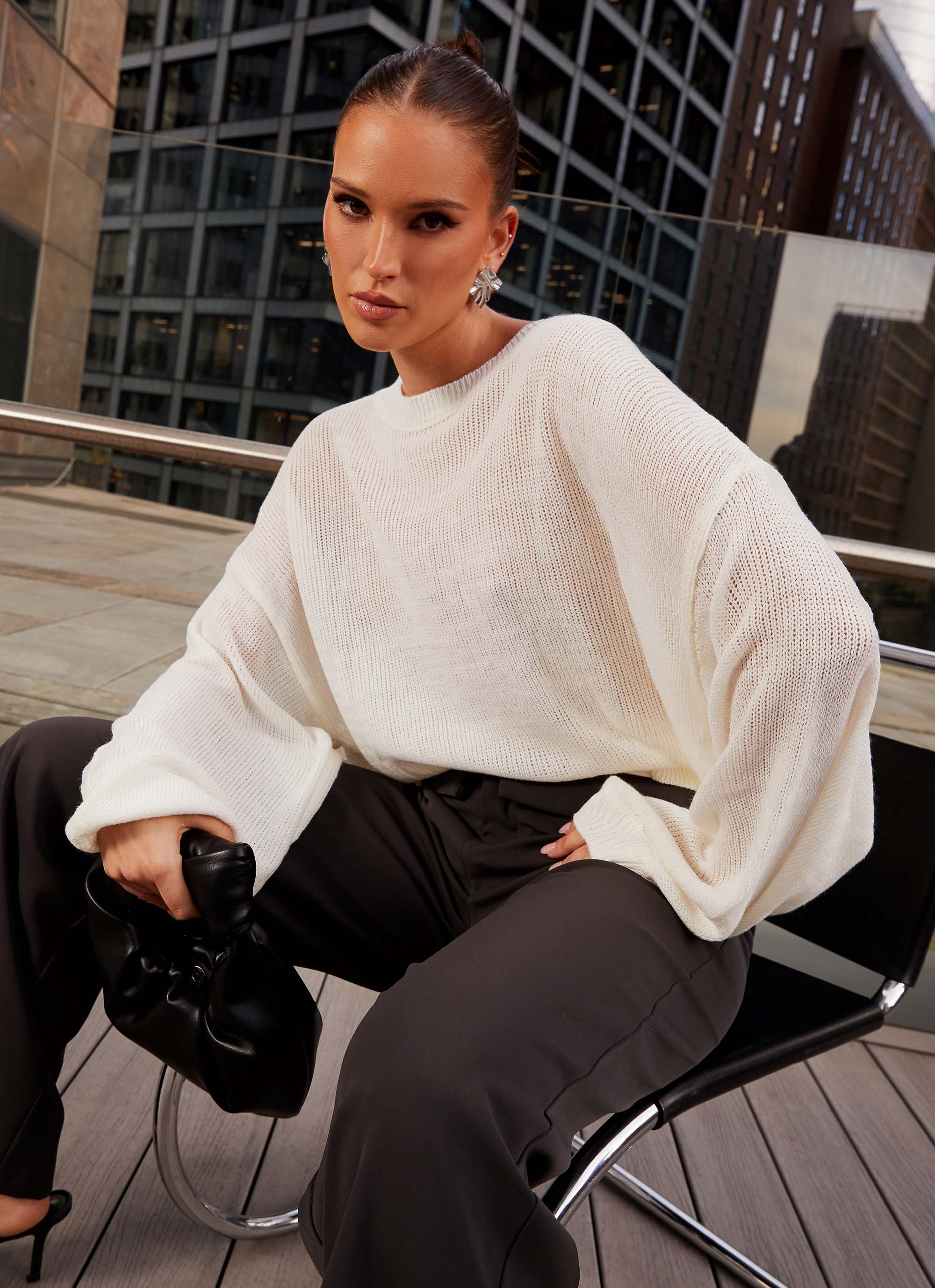 Womens Tyla Oversized Knit Sweater in the colour White in front of a light grey background
