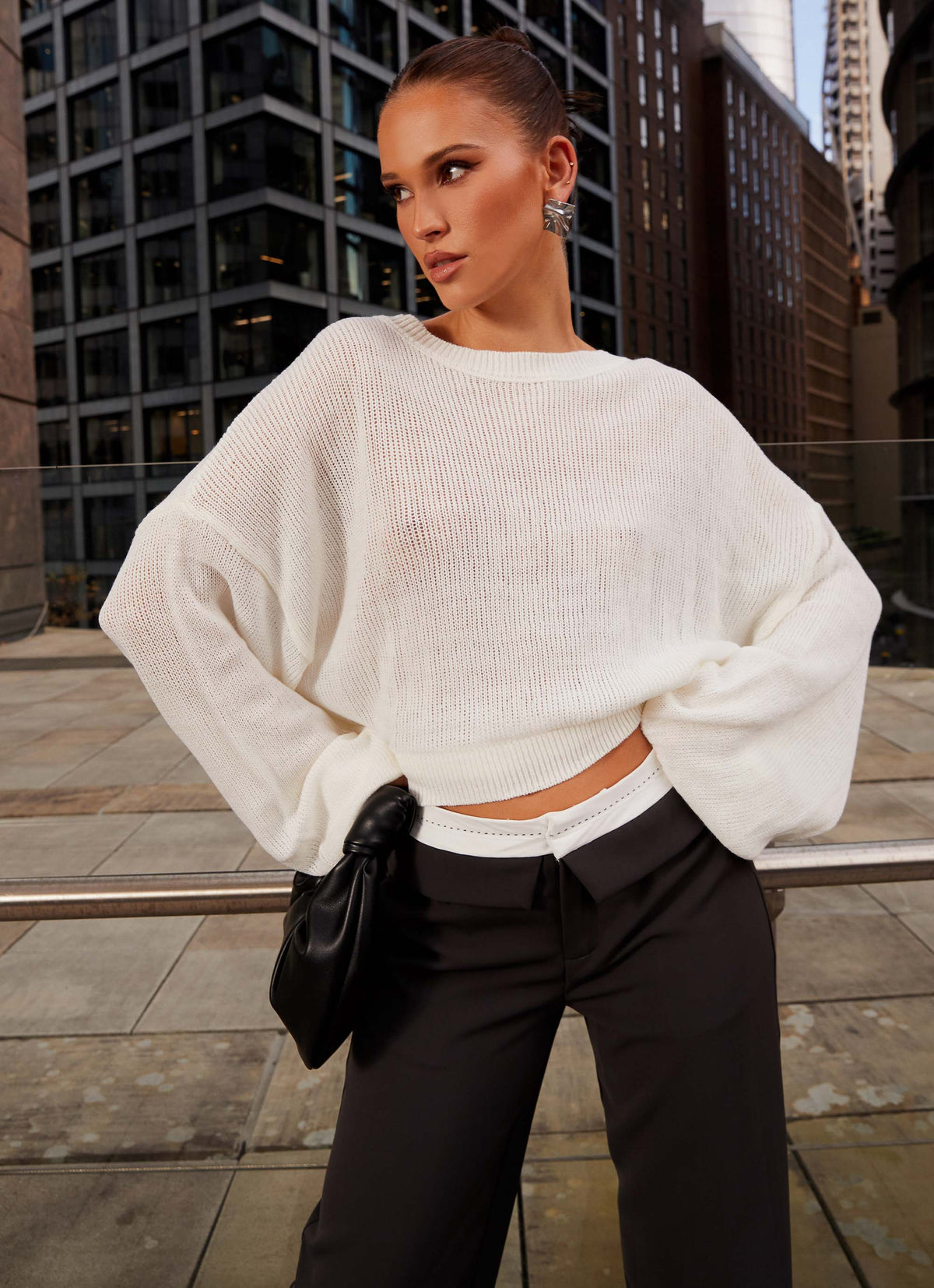 Womens Tyla Oversized Knit Sweater in the colour White in front of a light grey background