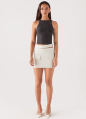Womens Danger Zone Cut Out Mini Skirt in the colour Ivory in front of a light grey background