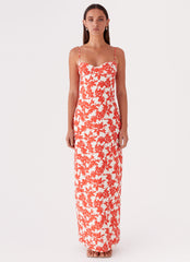 Womens Forbidden Floral Bustier Maxi Dress in the colour Red Floral in front of a light grey background