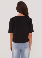 Womens Hacienda Linen Short Sleeve Blazer in the colour Black in front of a light grey background