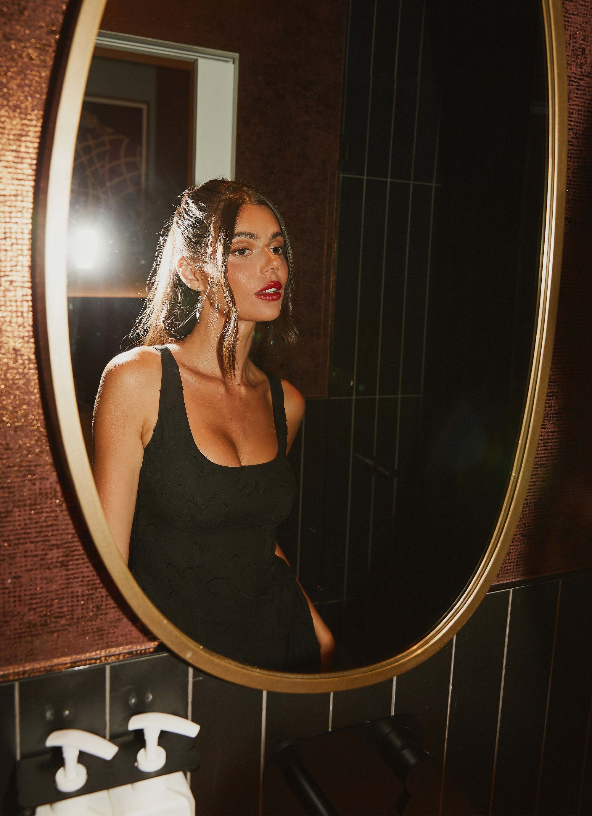 Womens Evelyn Mini Dress in the colour Black in front of a light grey background
