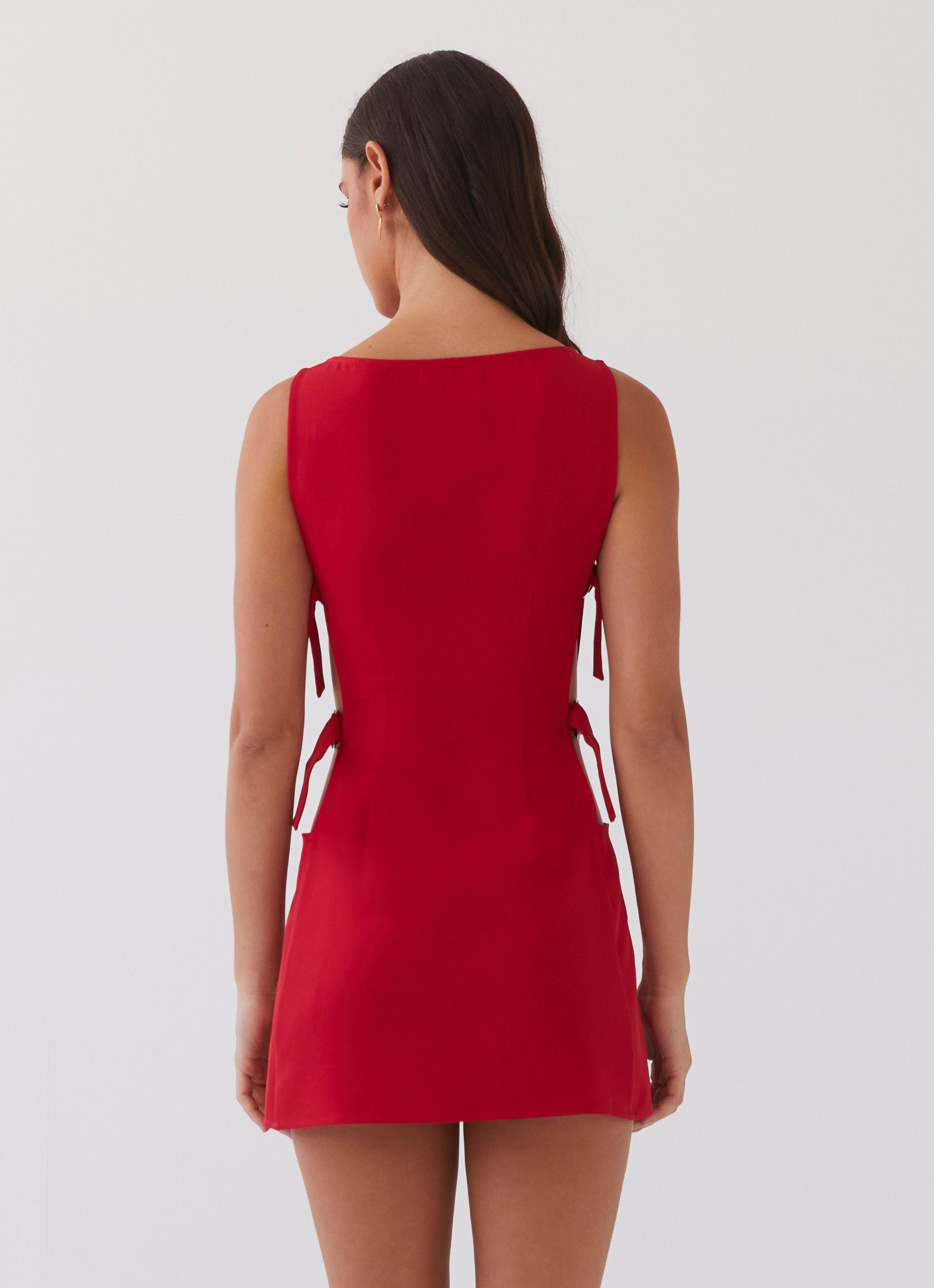 Womens Cherish You Buckle Mini Dress in the colour Red in front of a light grey background