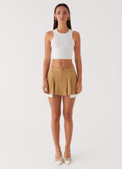 Womens Tegan Cargo Mini Skirt in the colour Tan in front of a light grey background