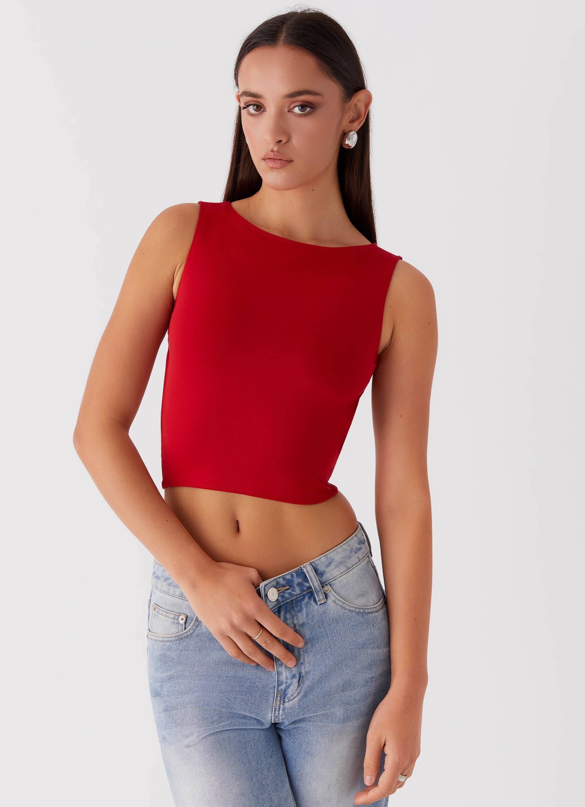 Womens Saskie Tie Top in the colour Ruby Red in front of a light grey background