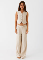 Womens Midnight City Suit Pants in the colour Beige in front of a light grey background