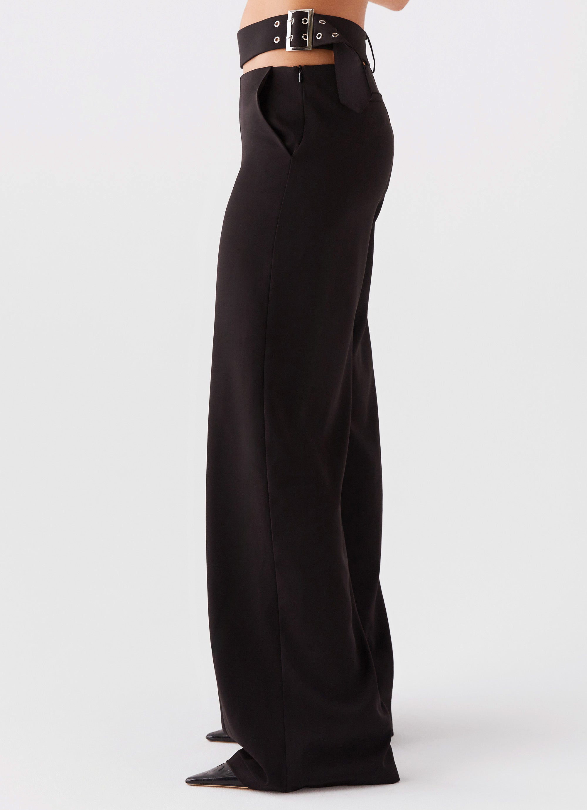 Womens The After Party Cut Out Belt Pants in the colour Black in front of a light grey background
