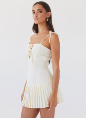 Womens Love Seeker Corset Mini Dress in the colour Ivory in front of a light grey background