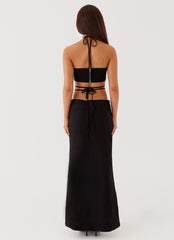 Womens Neveah Beaded Halter Top in the colour Black in front of a light grey background