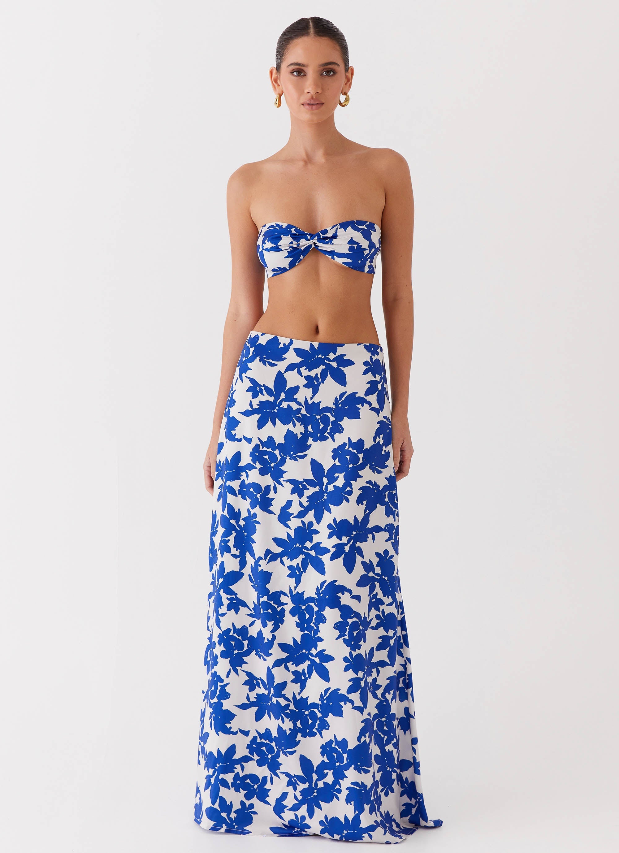 Womens Sky Gaze Twist Top in the colour Blue Floral in front of a light grey background