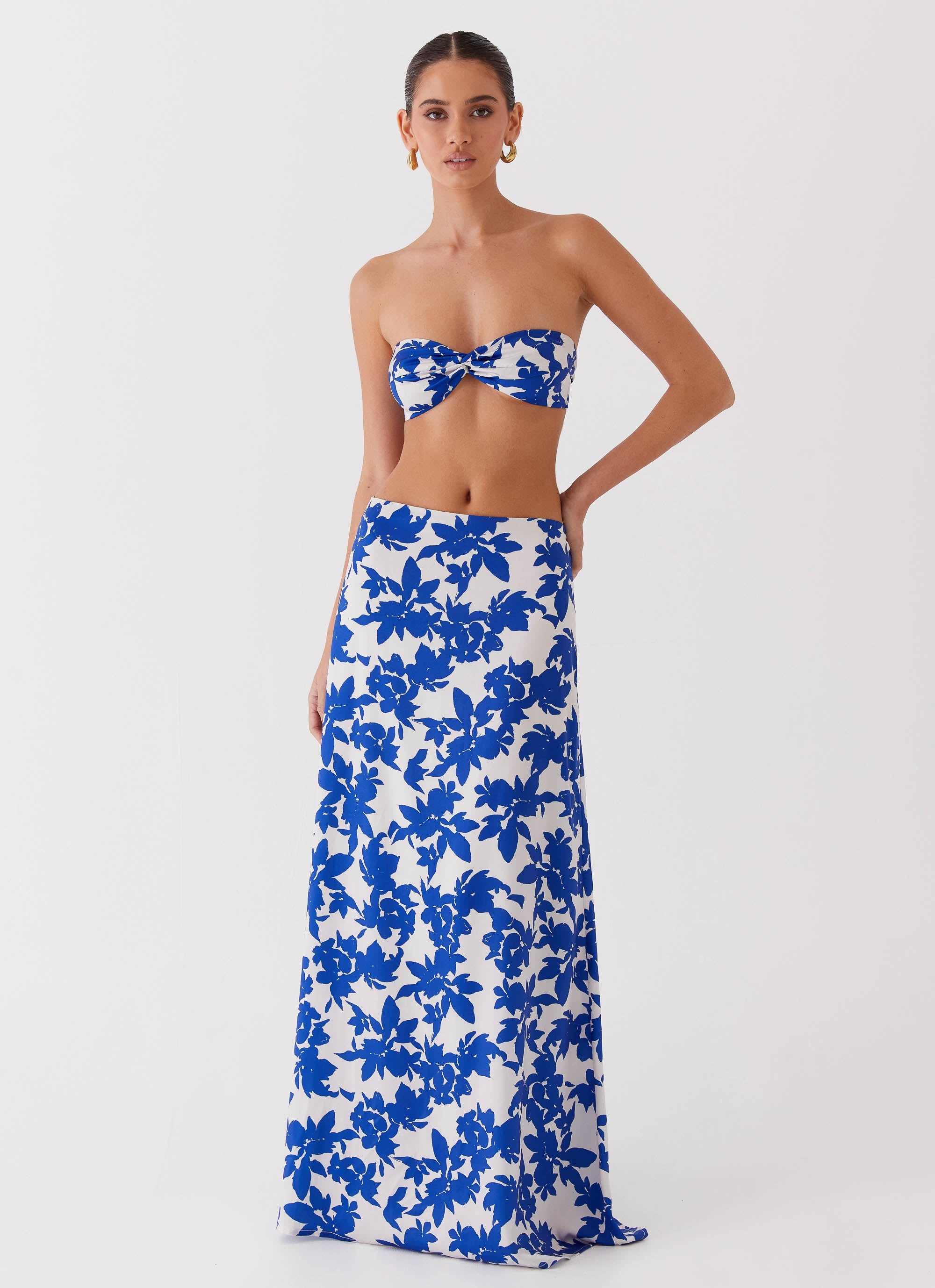 Womens Sky Gaze Twist Top in the colour Blue Floral in front of a light grey background