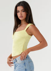 Womens Lylah Satin Top in the colour Yellow in front of a light grey background
