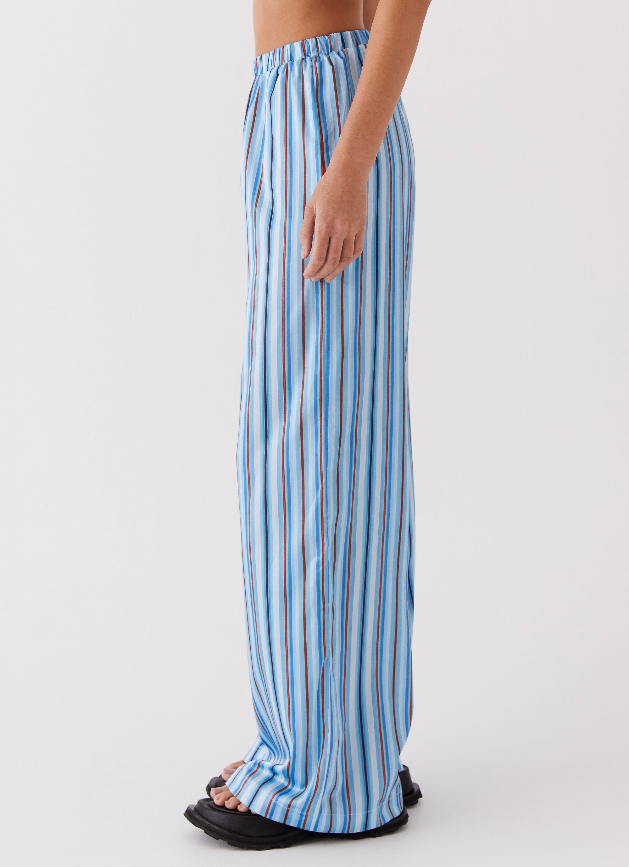 Womens Salta Satin Pants in the colour Blue Stripe in front of a light grey background
