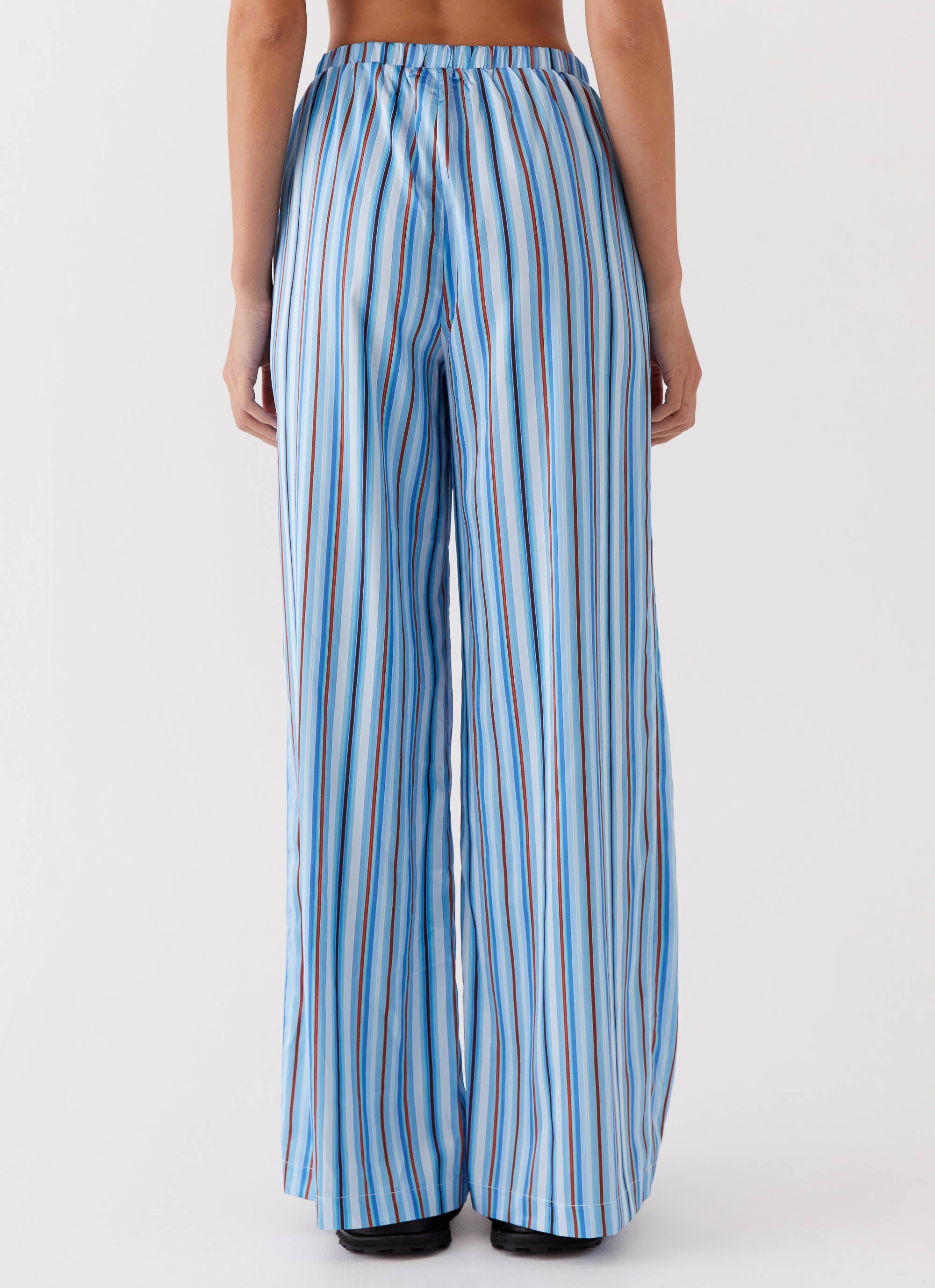 Womens Salta Satin Pants in the colour Blue Stripe in front of a light grey background