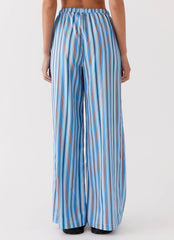 Womens Salta Satin Pants in the colour Blue Stripe in front of a light grey background