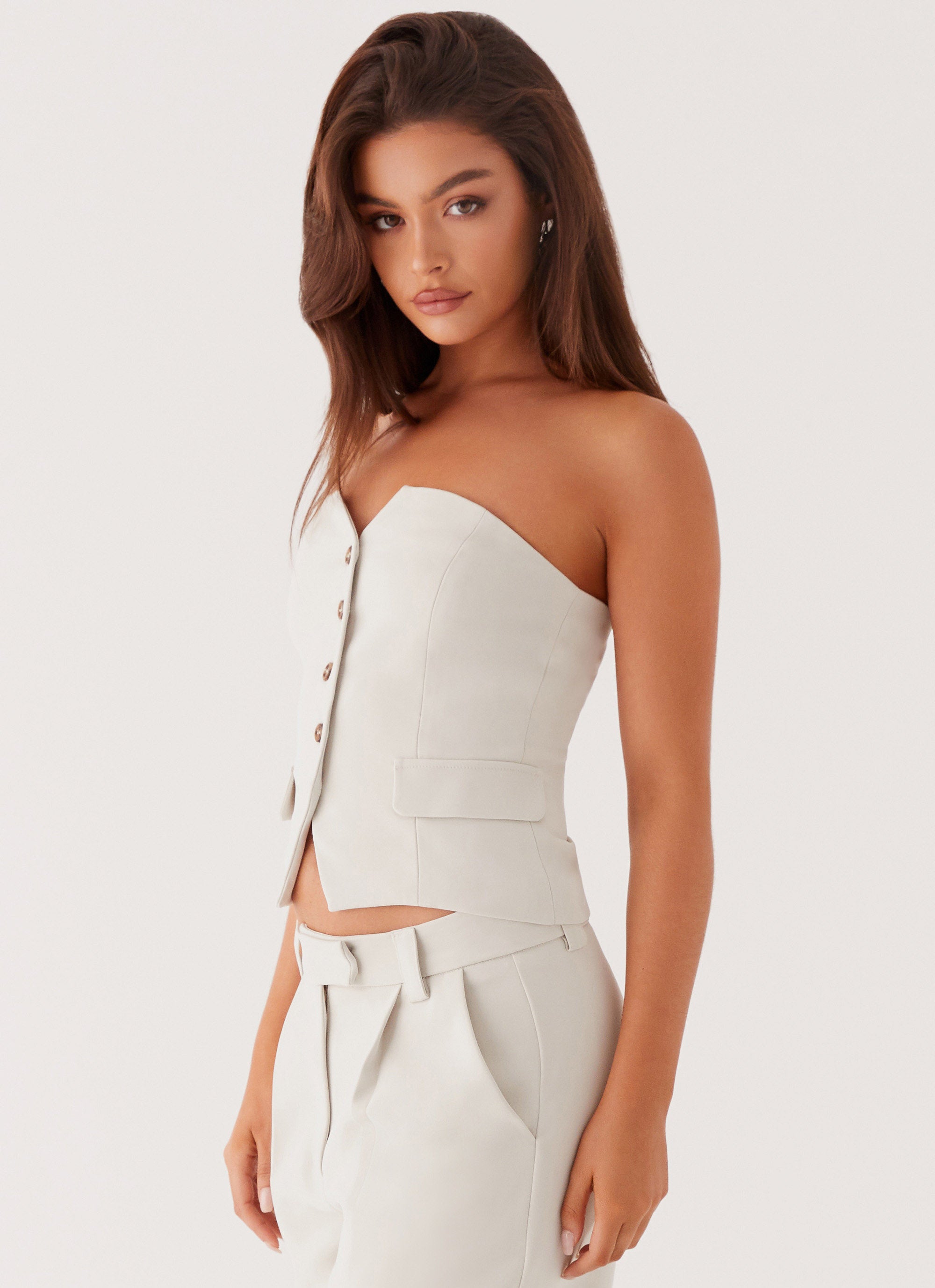 Womens Brianna Strapless Top in the colour Pebble in front of a light grey background