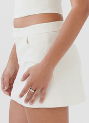 Womens Eliana Suit Mini Skirt in the colour Ivory in front of a light grey background
