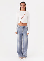 Womens Cassius Long Sleeve Top in the colour Ivory in front of a light grey background