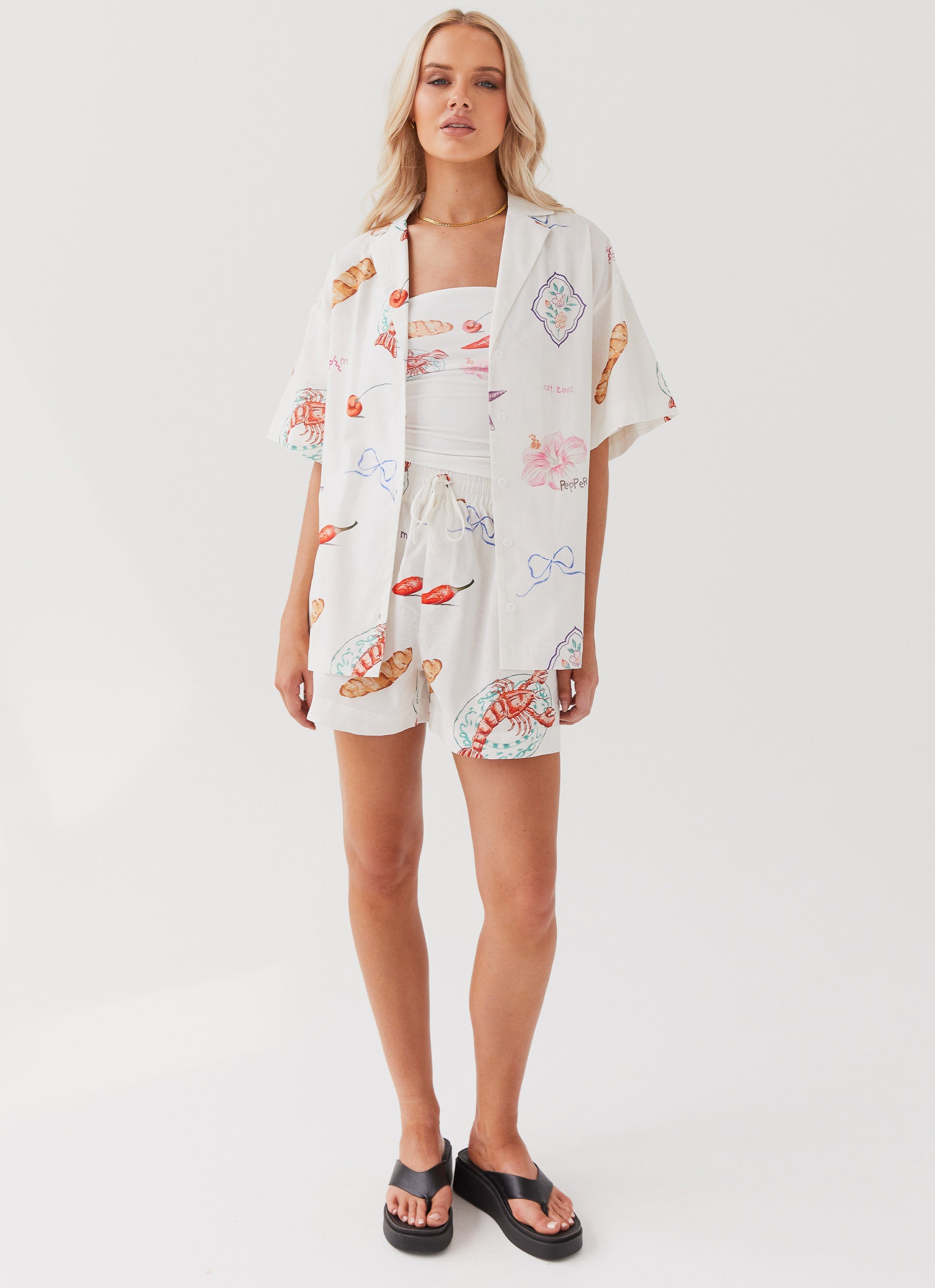 Womens Sweet Relief Oversized Linen Shirt in the colour Banchetto in front of a light grey background